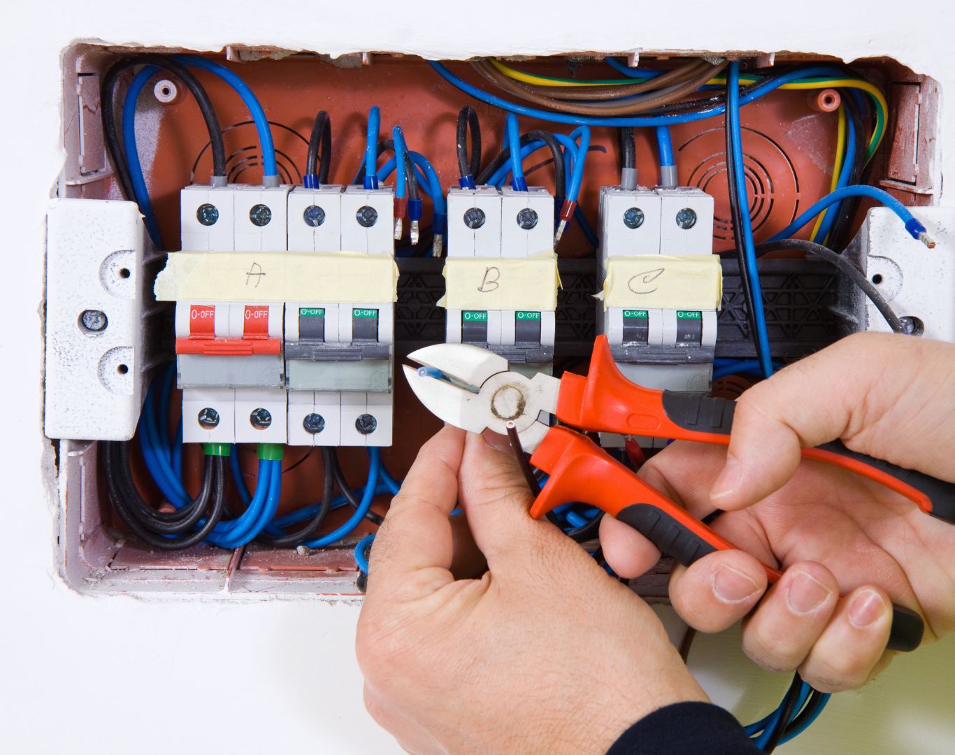 Trusted electrician near me in Goose Creek, SC installing lighting fixtures and electrical components safely